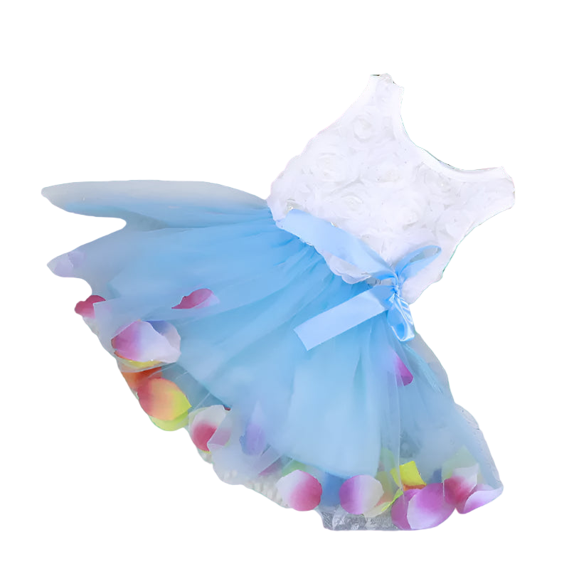 Children's dress with a blue skirt and colorful petals on a textured surface.