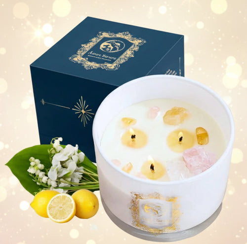 Candle with decorative elements and a blue box in the background