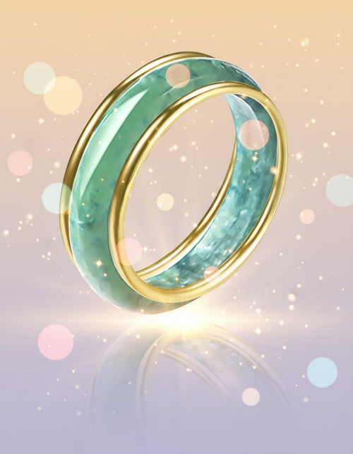 Ring with gold band and greenish-blue interior on a white background