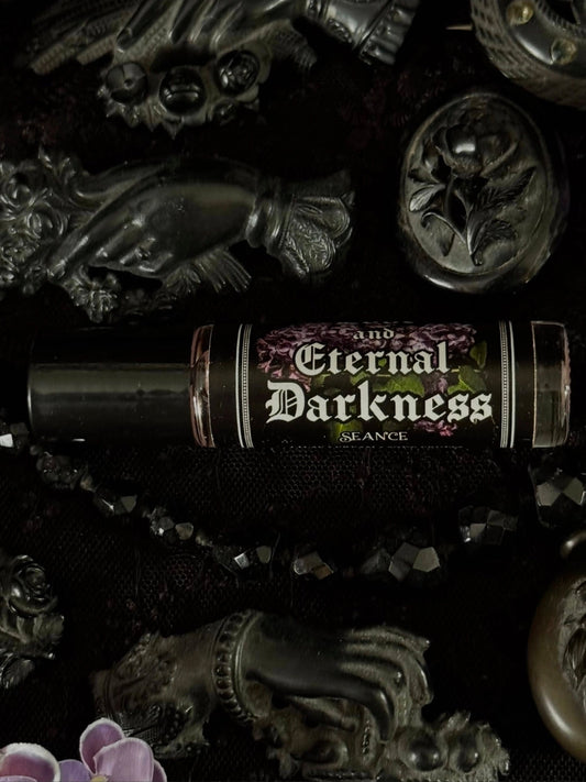 Vial labeled 'Eternal Darkness' surrounded by dark, ornate objects