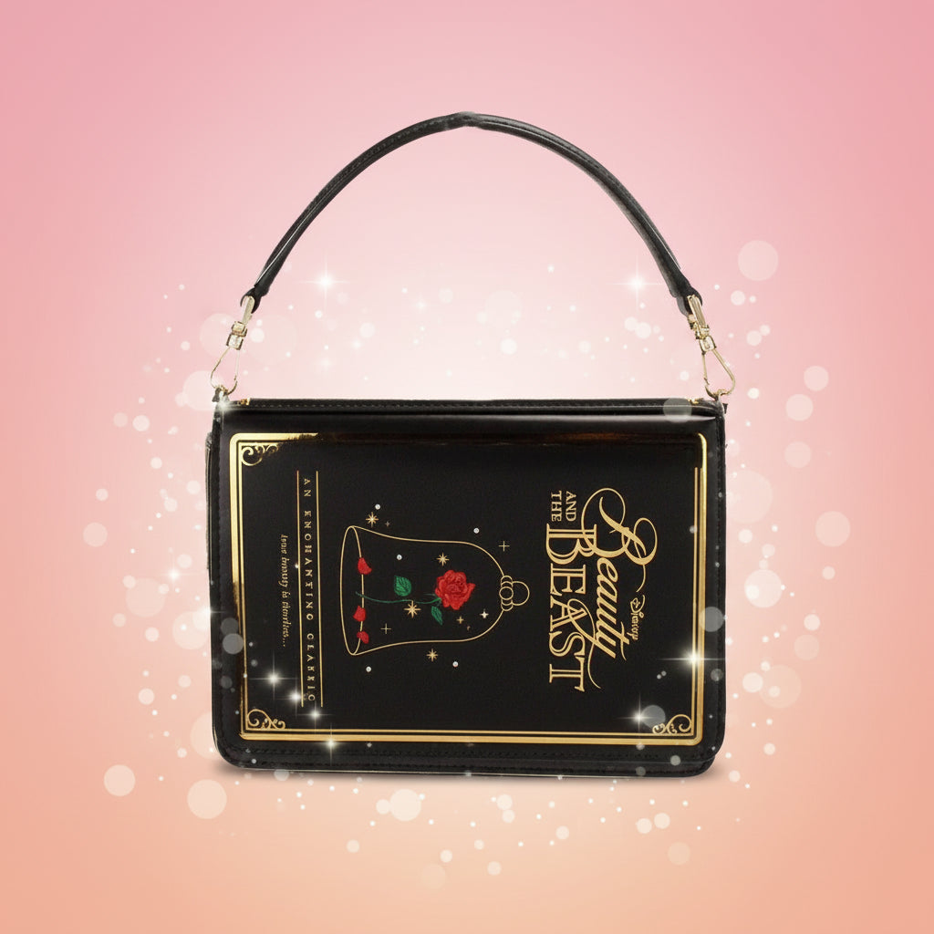 Black handbag with 'Beauty and the Beast' design on a white background