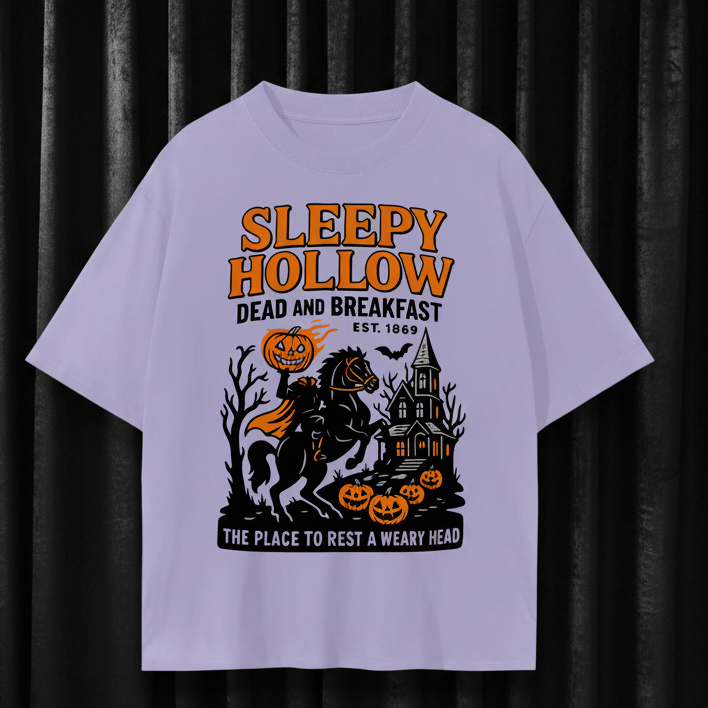 Purple t-shirt with 'Sleepy Hollow' graphic design featuring a horse and pumpkin.