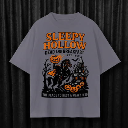 Gray t-shirt with 'Sleepy Hollow' graphic design featuring a horse, pumpkins, and a haunted house.