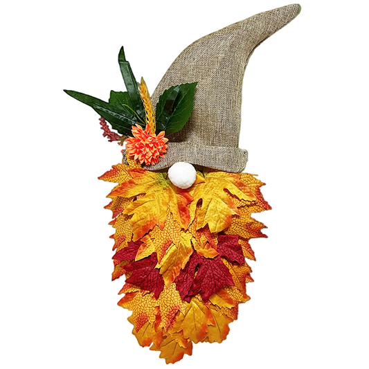 Decorative gnome with autumn leaves and a straw hat on a white background