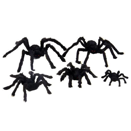 Black toy spiders on a white background
