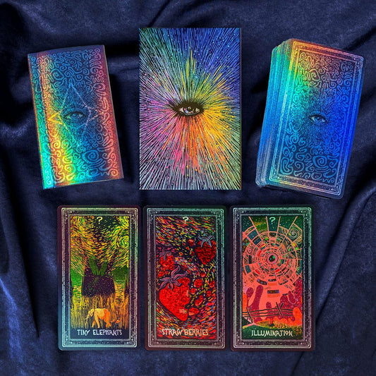 Set of colorful tarot cards on a dark fabric background