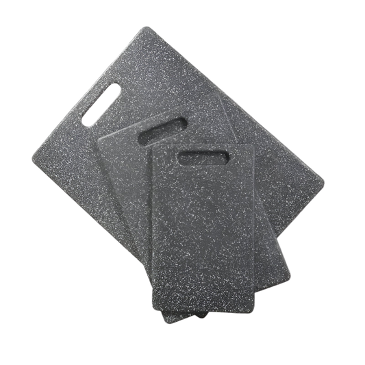 Three gray sanding blocks on a white background
