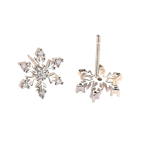 Silver snowflake earrings on a soft white background