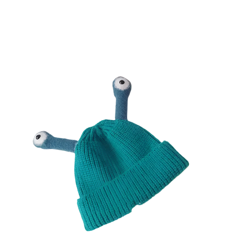 Teal knit hat with cartoonish arms and legs on a light gray background
