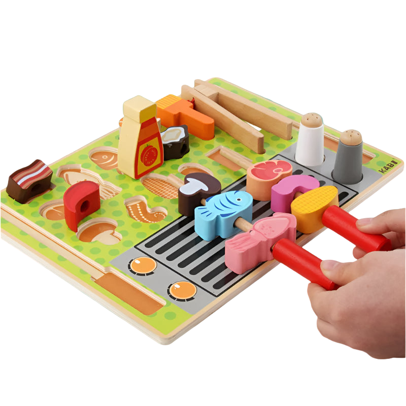 Colorful wooden hammering toy with various shapes and a hand using a hammer on a white background