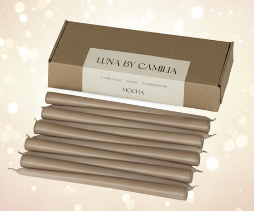 Set of mocha candles with a cardboard box labeled 'Luna by Camilia' on a beige background