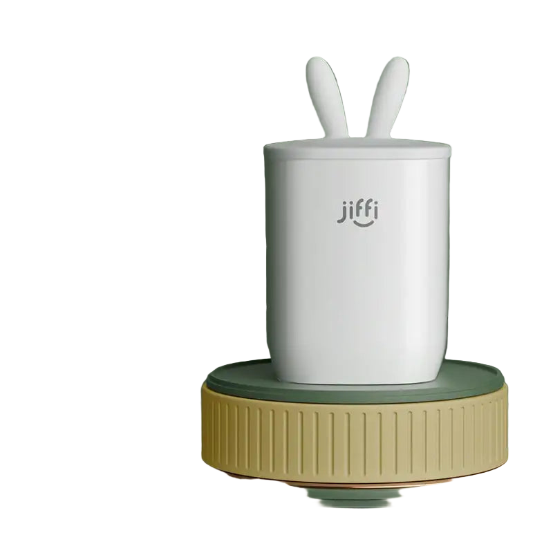 White container with rabbit ears labeled 'jiffi' on a green platform