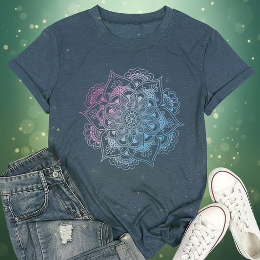 Blue t-shirt with a mandala design, paired with jeans and white sneakers on a white background