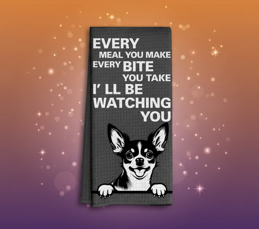 Tea towel with a dog illustration and humorous text on a black background