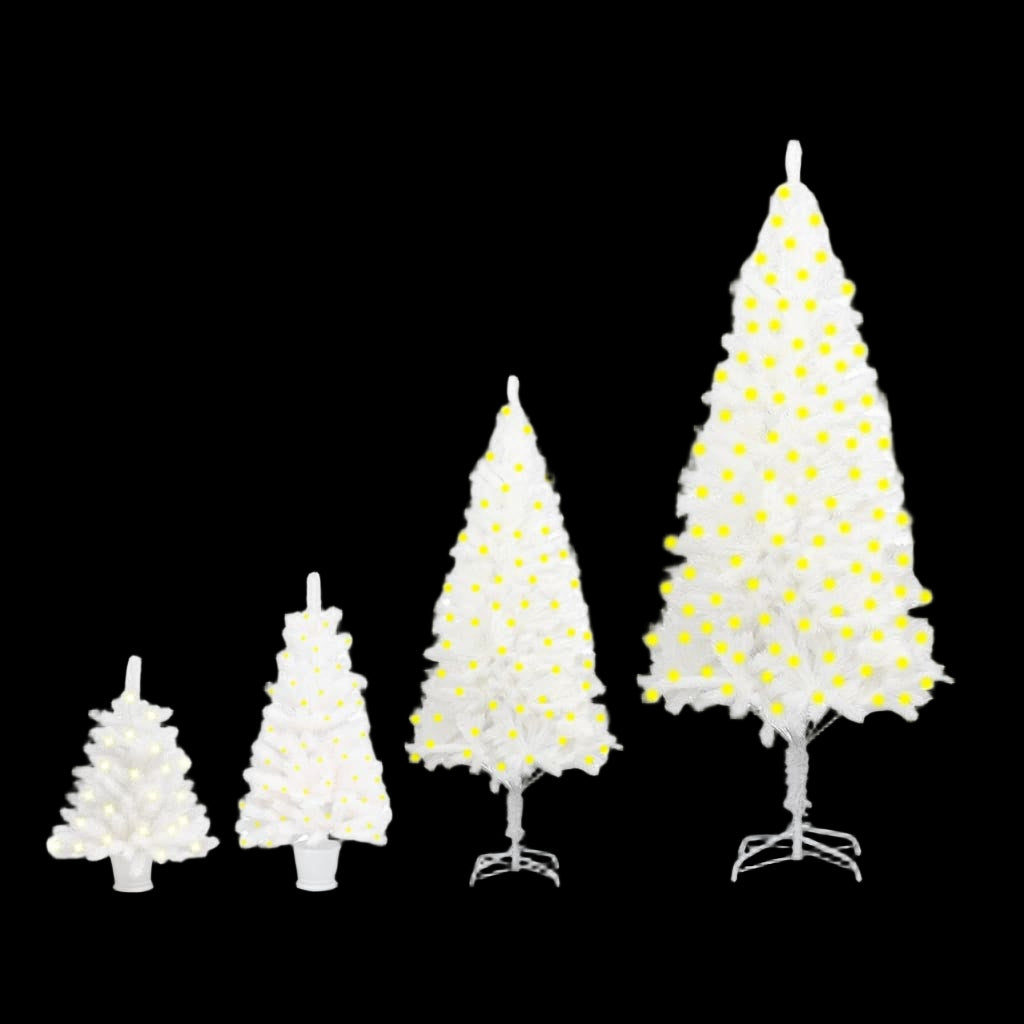 Set of four small pre-lit Christmas trees with white bases on a white background