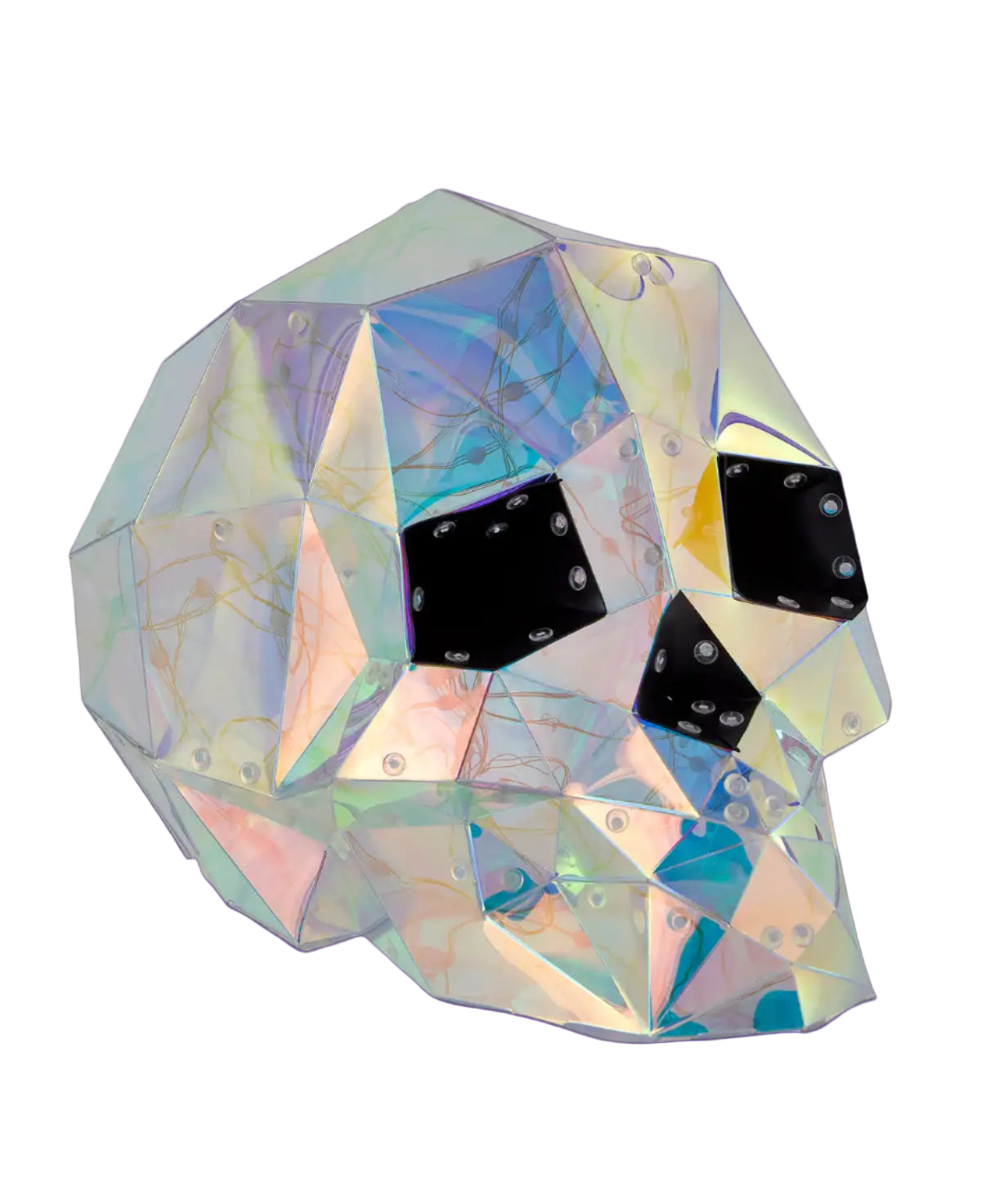 Multicolored geometric mask with black eye sockets on a white background