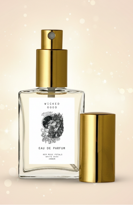 Perfume bottle with gold cap and label on a light background