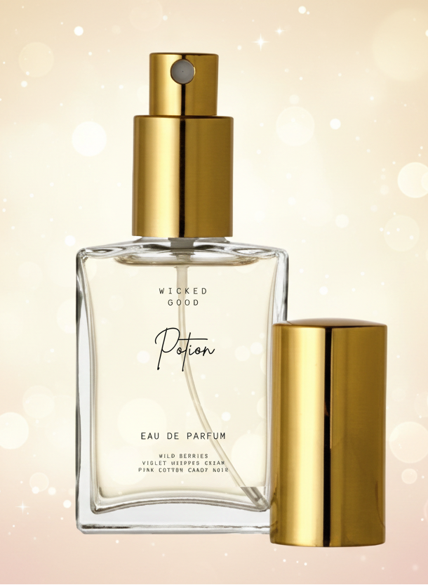 Perfume bottle with gold cap and clear body on a white background