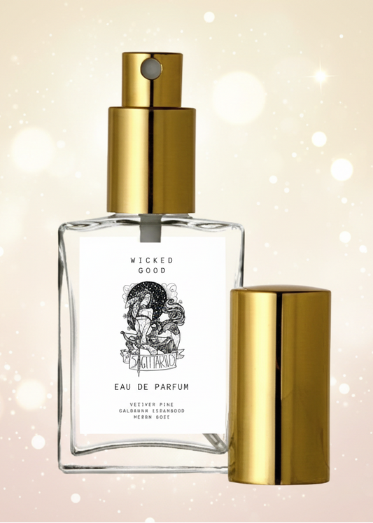 Perfume bottle with gold cap and label on a beige background