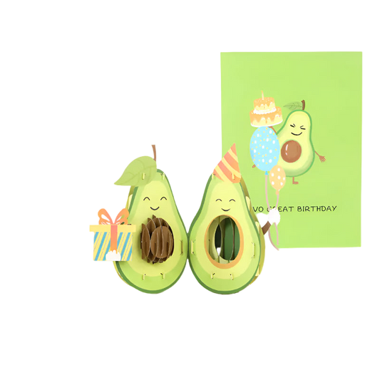 Avocado-themed pop-up card with a smiling avocado and a birthday card in the background.