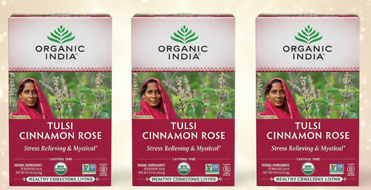 Three boxes of Organic India Tulsi Cinnamon Rose on a white background