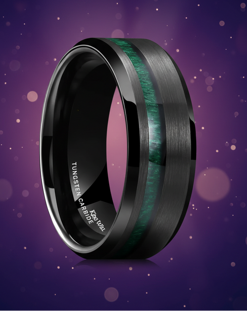 Black tungsten carbide ring with green inlay on a white background
