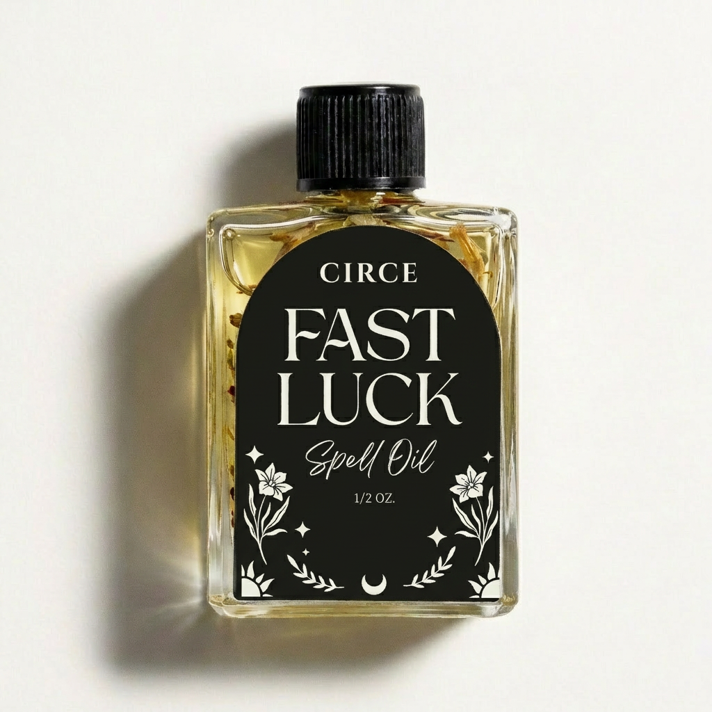 A 1.2 oz glass bottle of Circe Fast Luck Spell Oil with a black cap and a black label featuring white text and floral illustrations, set against a plain off-white background with a soft shadow.