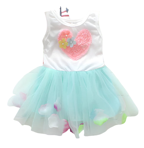 Children's dress with a heart design on a wooden surface