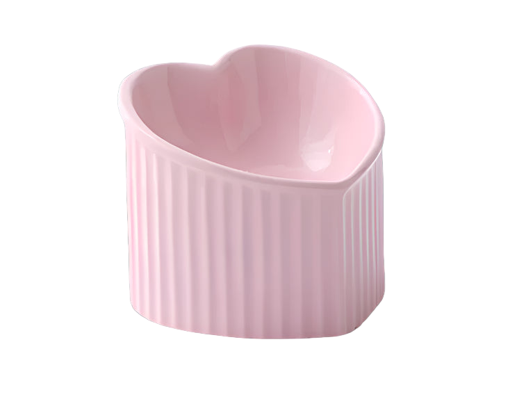 Pink heart-shaped ceramic ramekin on a white background